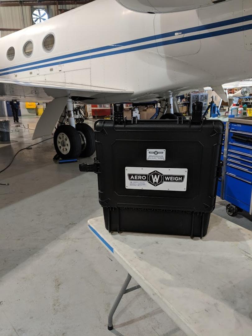 weighing a falcon jet, weighing a jet, weighing a falcon 900, aircraft scale, aircraft scales, wireless aircraft scales. wireless aircraft scale, large jet scales, large jet weighing, airplane scales, aircraft weighing equipment, aircraft rental scales. aircraft rental scale, rental aircraft scale system, aircraft scale system, wireless aircraft scale system, Gulfstream scales, gulfstream aircraft scales, EMB scales, RJ scales, 